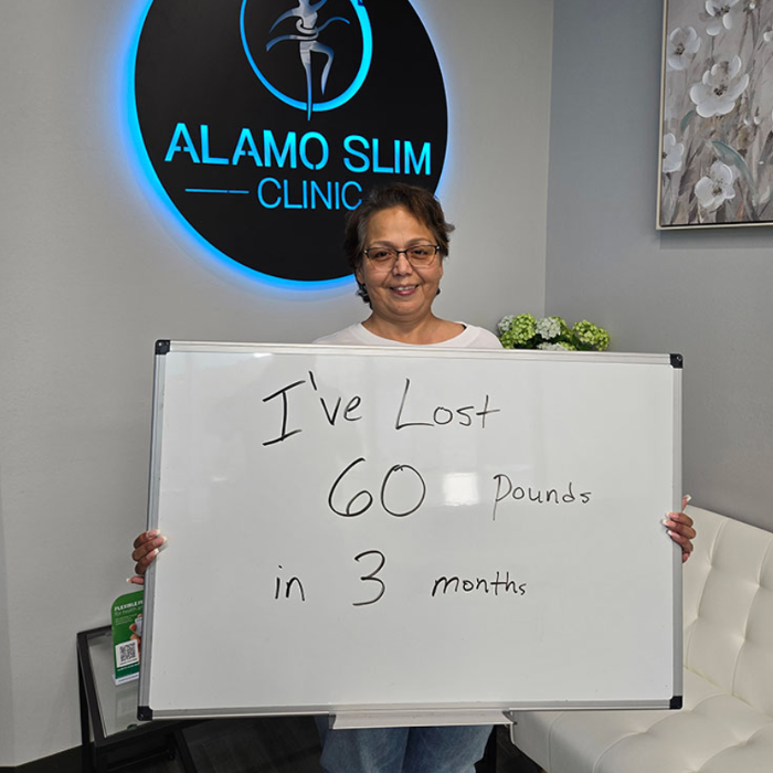 Happy client down 60 pounds