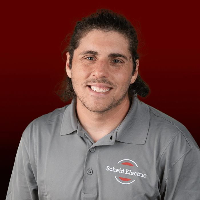 Licensed electrician from Scheid Electric helping customers with safe and efficient electrical solutions in Queen Creek.