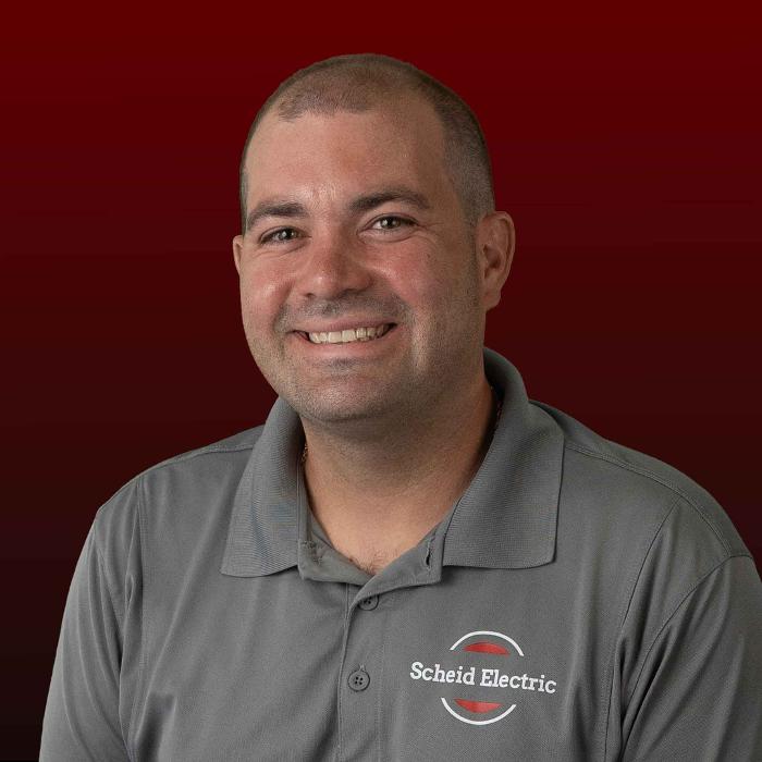 Licensed electrician from Scheid Electric providing reliable electrical services in Queen Creek, Arizona.