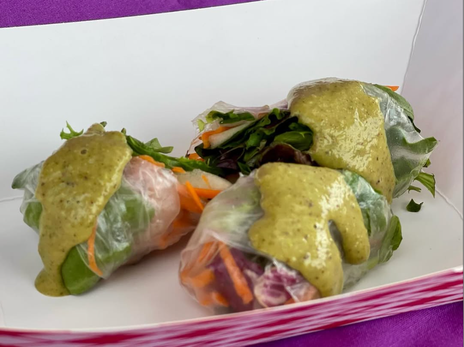 Fresh Thai spring rolls wrapped with crisp vegetables and herbs, served with a flavorful dipping sauce&mdash;light, healthy, and perfect for those looking for fresh options near Lafayette and Erie.
