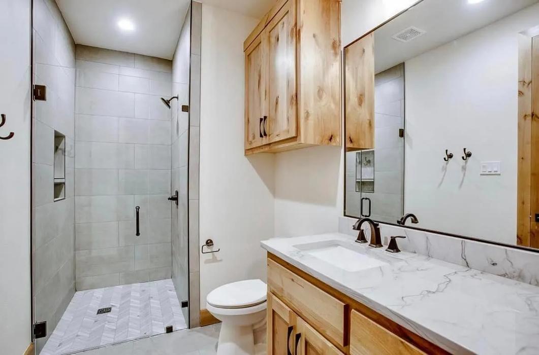 Bathrooms, including countertops, showers, bathtubs, and floors! Your materials can be granite, quartz, quartzite, dolomite, or natural stone.