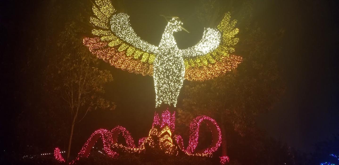 A festive illuminated angel display with warm glowing lights and decorative accents, creating a striking holiday focal point.