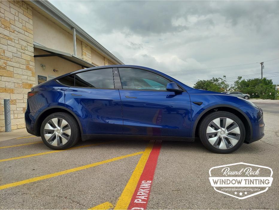 Telsa Model Y tinted at Round Rock Window Tinting, Round Rock, Texas. Ceramic tint used to reduce heat and block 99% UV.