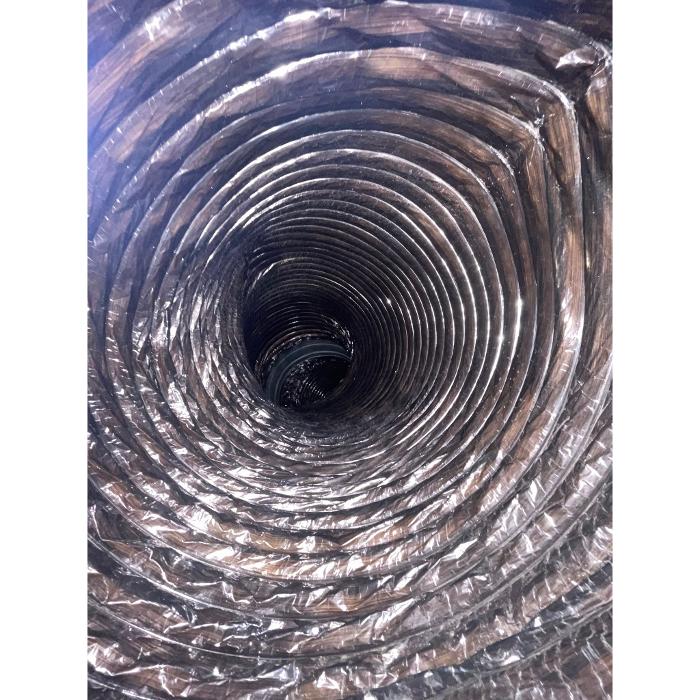 Detailed interior shot of flexible ductwork after service, illustrating cleaner airflow pathways and healthier indoor air conditions.