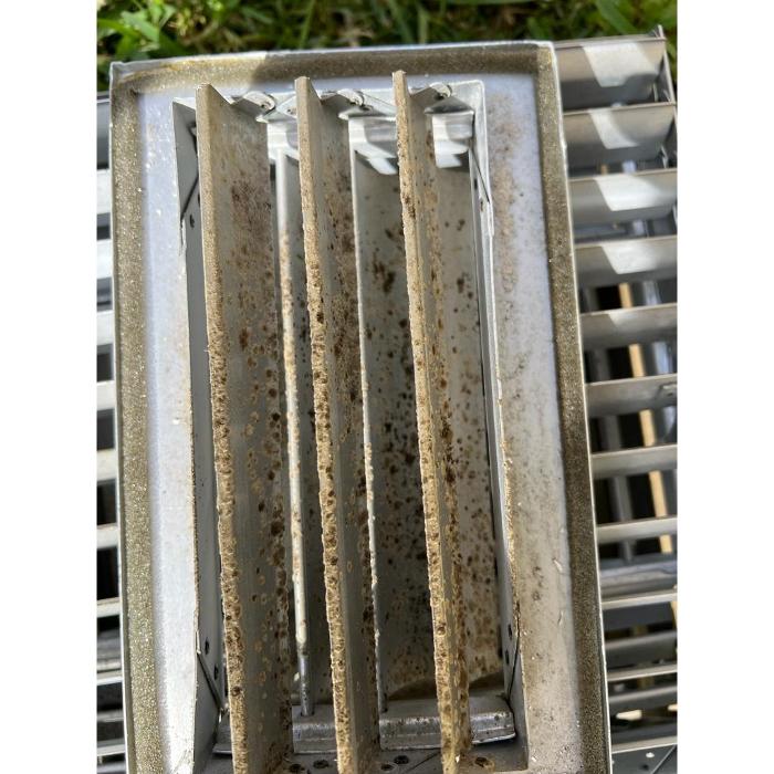 Several used air filters showing heavy dust and debris buildup, highlighting the importance of regular filter replacement and HVAC maintenance.