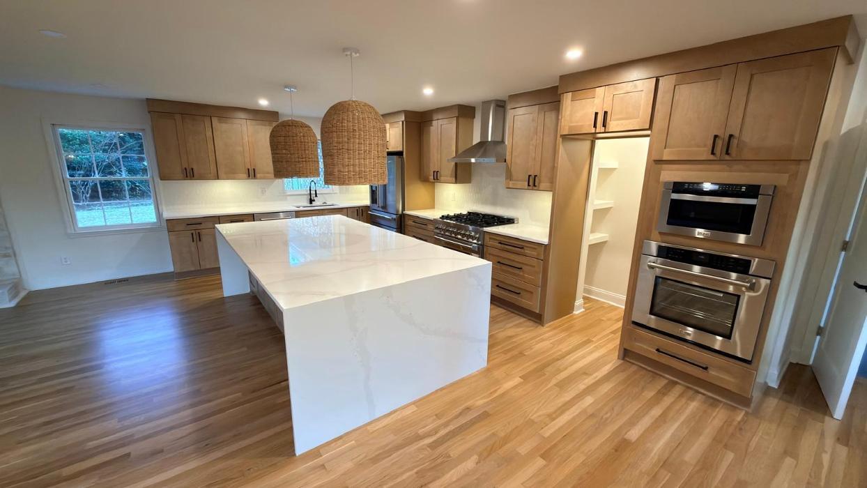 Custom cabinets and quartz countertops project by TS Cabinets in Charleston, SC. High-end custom kitchen cabinets, marble and granite countertops installation, and luxury kitchen remodeling services. 