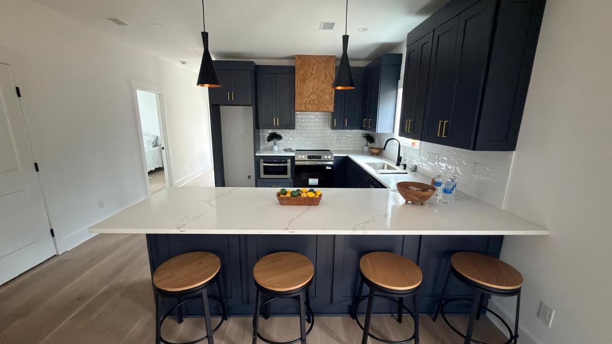 Custom cabinets and quartz countertops project by TS Cabinets in Charleston, SC. High-end custom kitchen cabinets, marble and granite countertops installation, and luxury kitchen remodeling services. 