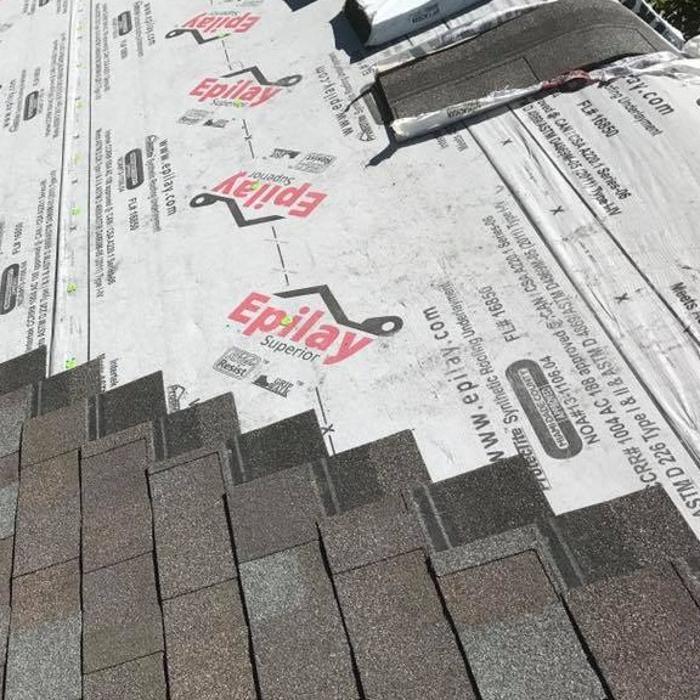 Owens Corning shingle installation by MAS Roofing Siding & Decking Inc. Premium roofing materials with 15-year workmanship warranty. Roof replacement serving Freeport and Northwest Illinois.
