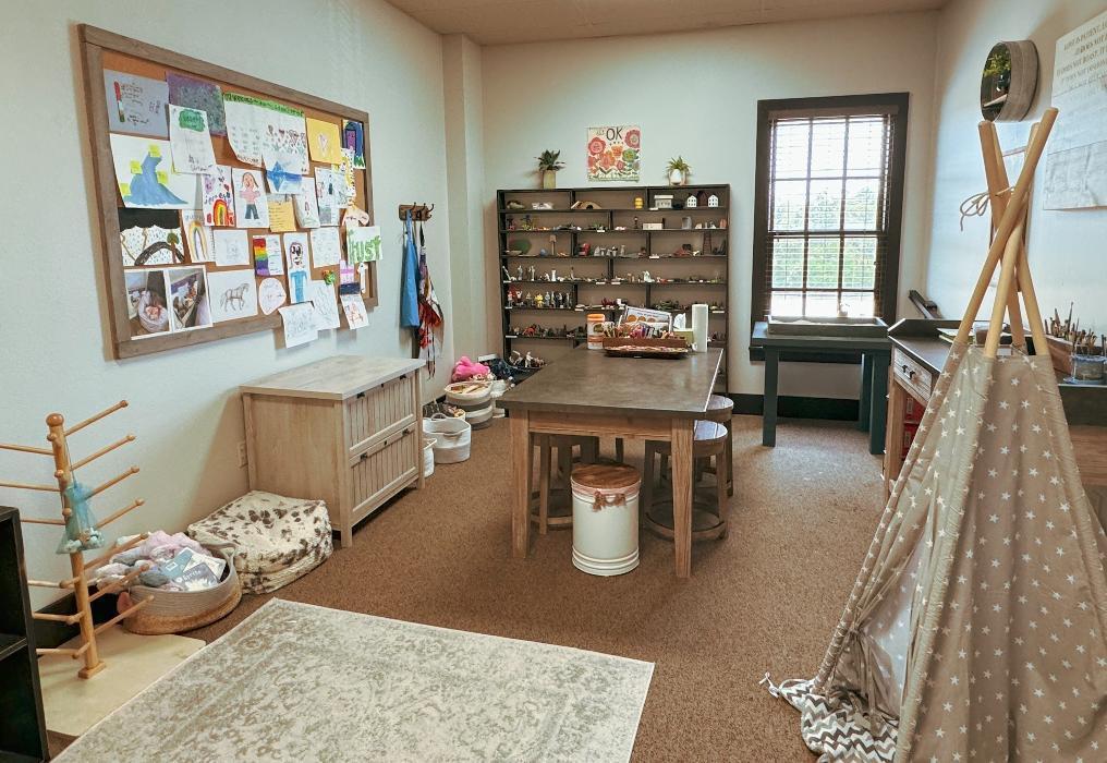 Play therapy room at Redeemed Life Counseling in Argyle, TX, featuring toys, art supplies, and a welcoming space designed to help children express emotions and heal.