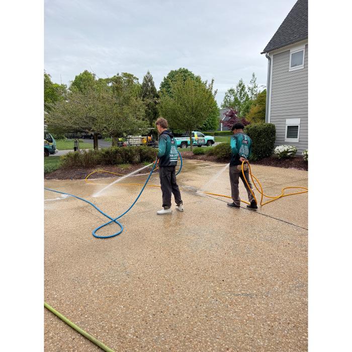 Driveway being cleaned by Wash Works in Rehobeth Beach Delaware