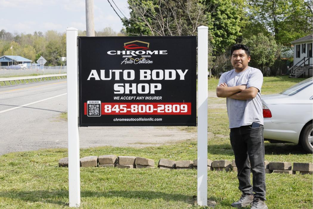 Owner of Chrome Auto Collision standing outside the shop in Middletown NY serving Orange County with collision repair.
