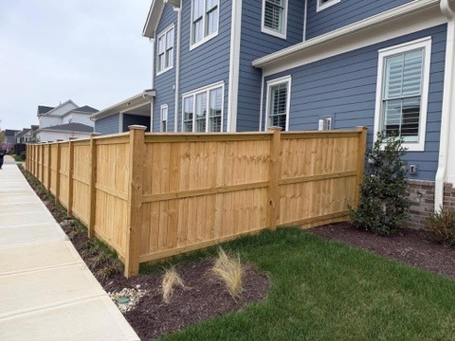 Completed exterior wood fencing project by BisonWorks, helping homeowners improve privacy, curb appeal, and outdoor living spaces with quality craftsmanship.