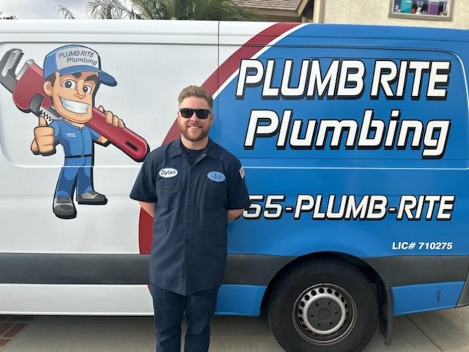 Plumb Rite Plumbing technician standing by branded van in Rancho Cucamonga, California