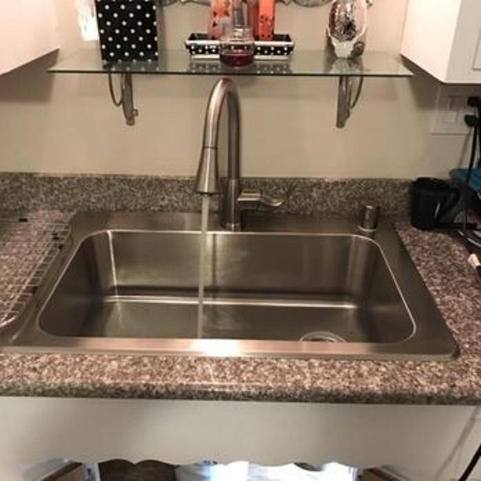Stainless sink installation.