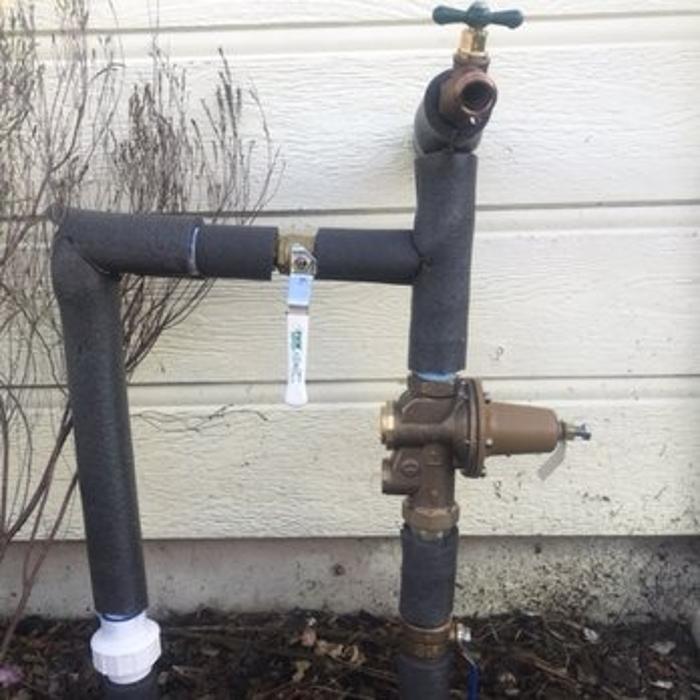 Outdoor water faucet installation.