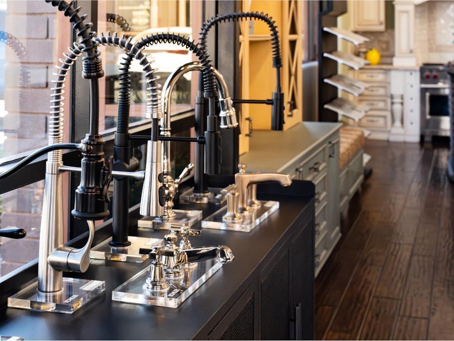 A selection of sink fixtures for your kitchen at the Premier Design-Build-Remodel Mesa Showroom.