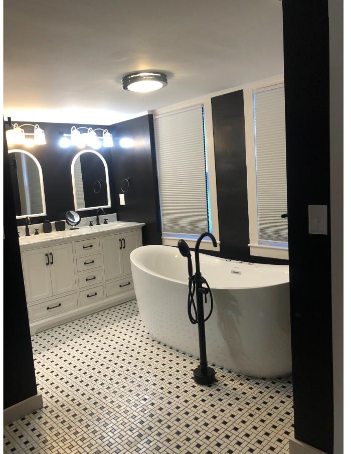 Modern bathroom with freestanding tub and double vanity
