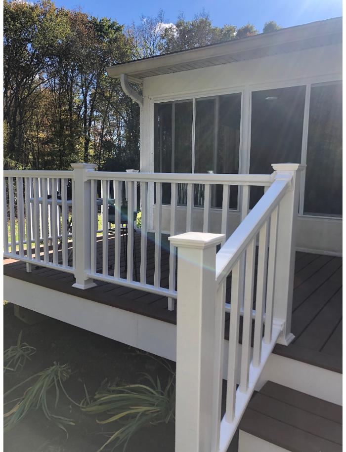 Elevated composite deck with white railing system
