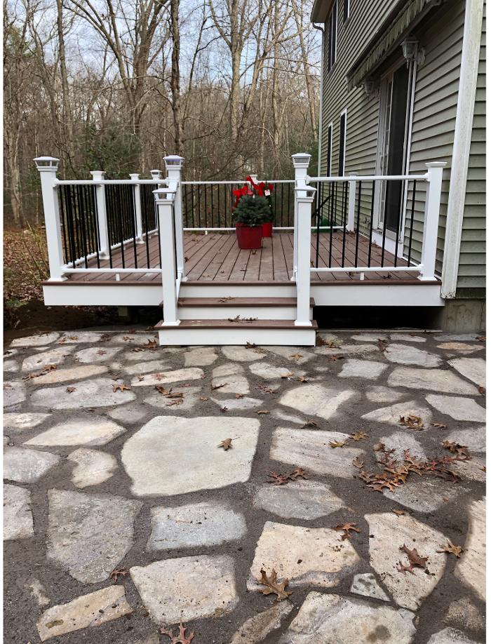 Composite deck with white posts and black railings