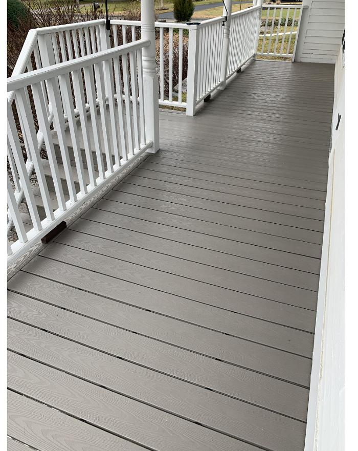 Gray composite porch deck with white railings