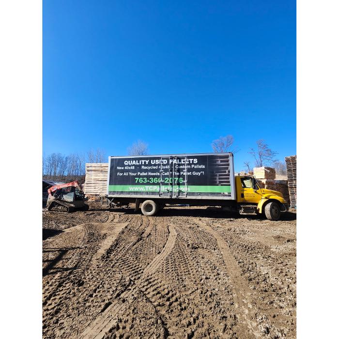 Quality Used Pallets truck at a pallet supplier yard in Shakopee, Minnesota