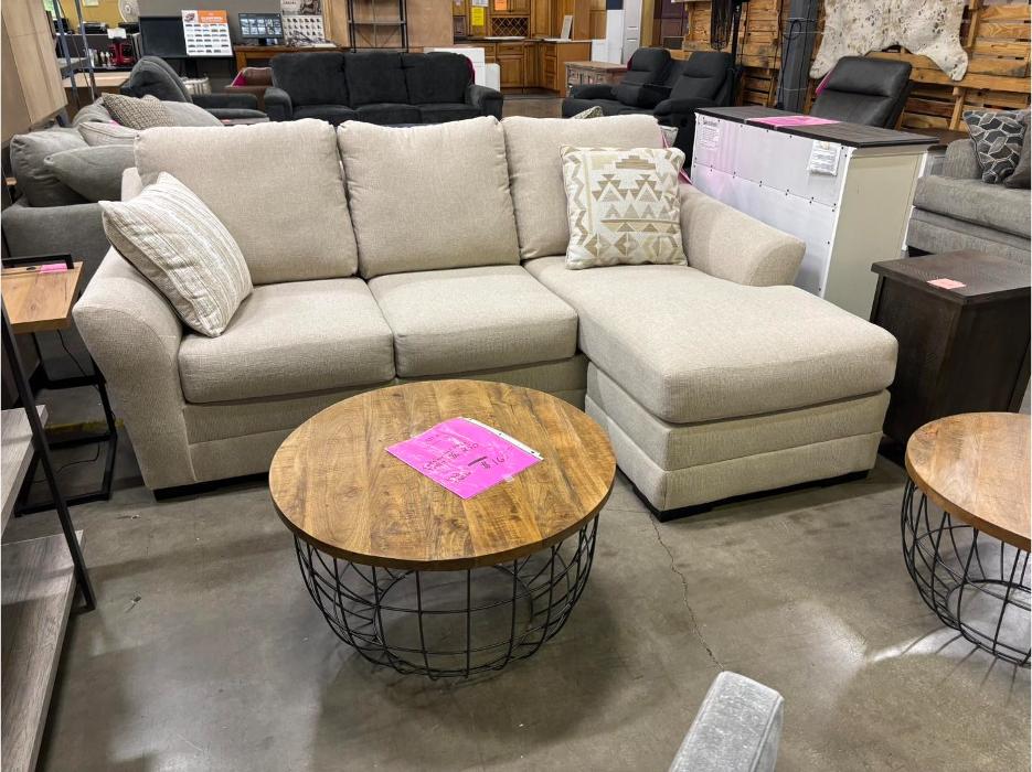 Beige sectional sofa with chaise at Furniture & Cabinet Outlet in West Chester Township, Ohio.