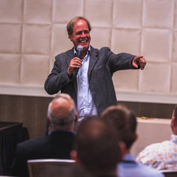 Dr. Reed Moeller speaks during a wellness and health presentation focused on chiropractic care, recovery, mobility, and overall wellness in Cincinnati, Ohio.