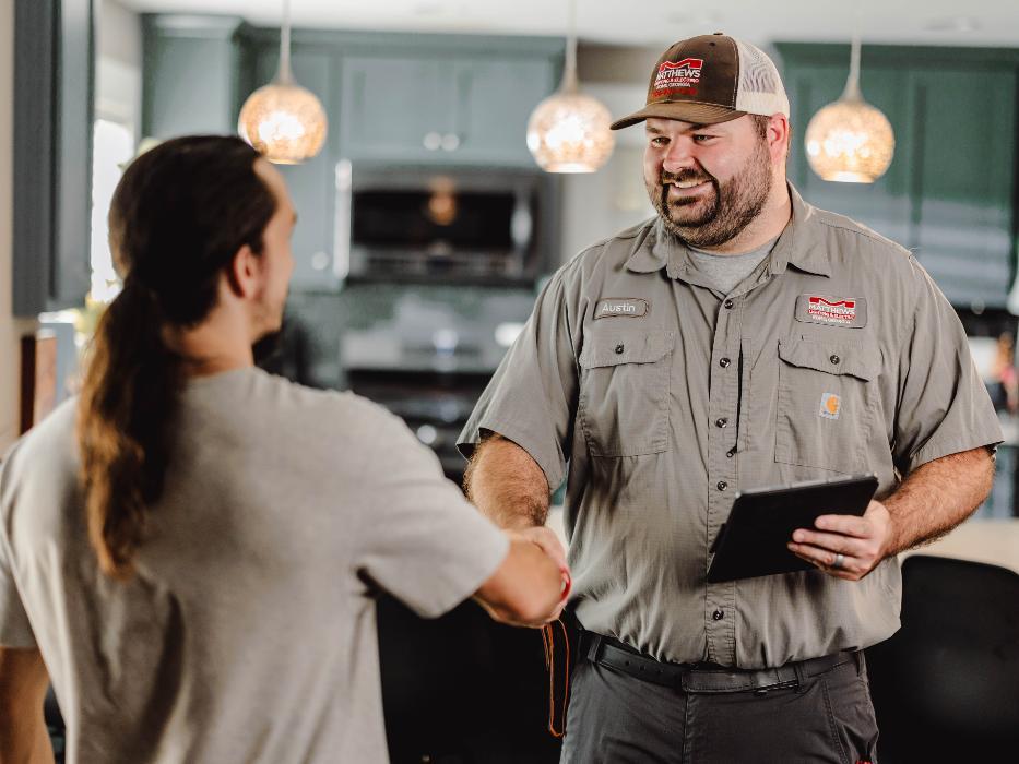 Austin Matthews delivering clear communication & upfront pricing on a home electrical quote.