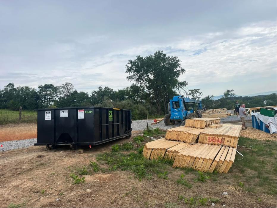 EZ Dumpster Services roll-off dumpster at a construction site near Staunton, Virginia.