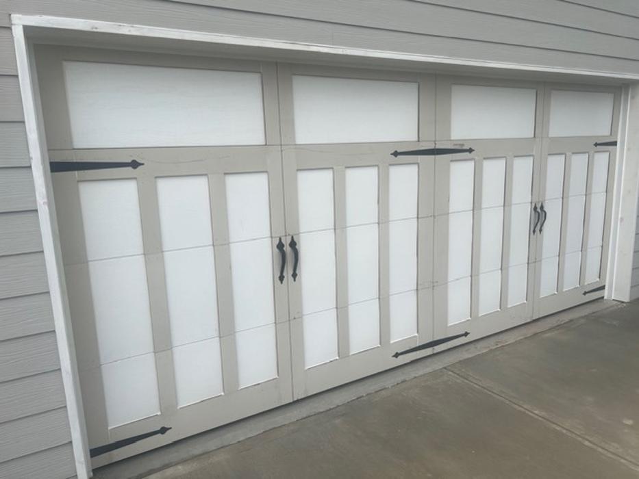 White sectional garage door with a clean modern finish — Hawk Garage Doors