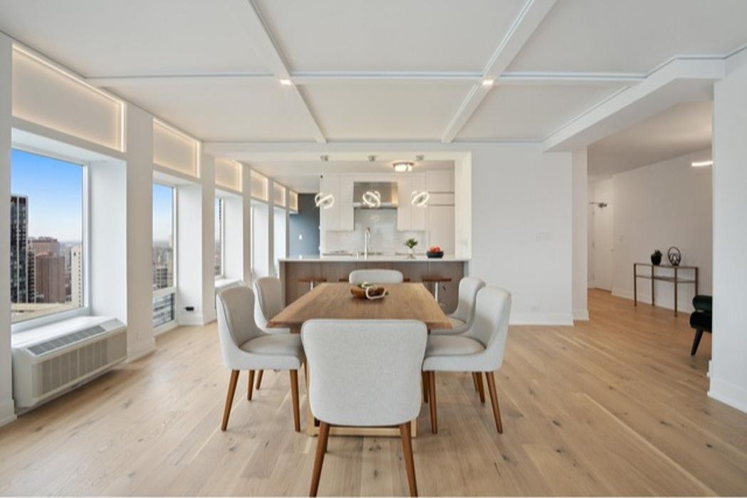 Bright remodeled dining and kitchen area by Post Services Inc, general contractor in Northfield, IL.