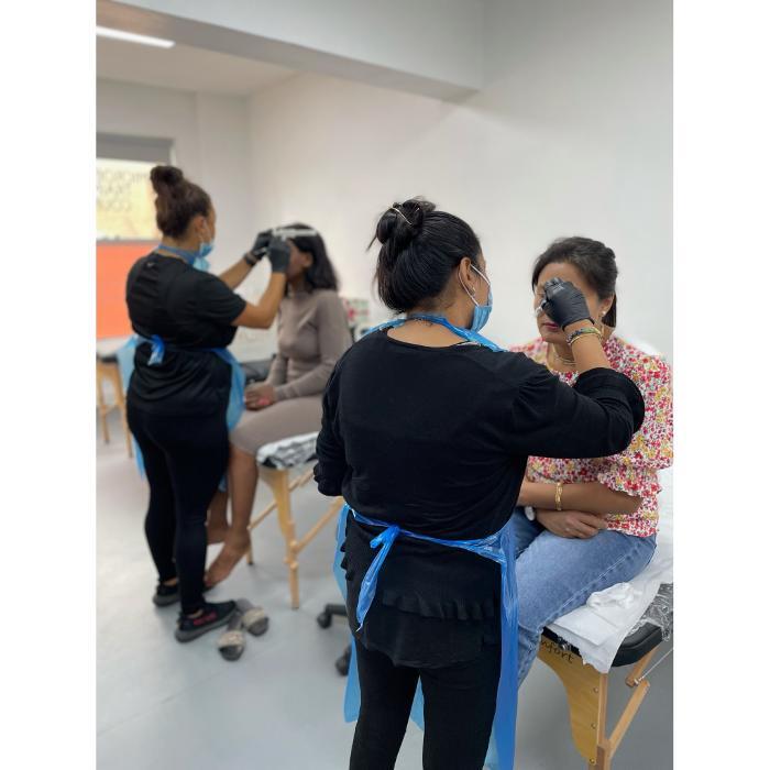 Student and tutor photo at Eclipse School of Beauty & Aesthetics in Bexleyheath, promoting the Fast Track Aesthetics Course.