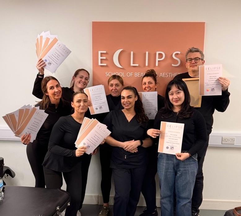 Student certificate photo at Eclipse School of Beauty & Aesthetics, promoting the Fast Track Aesthetics Course and beauty school training.