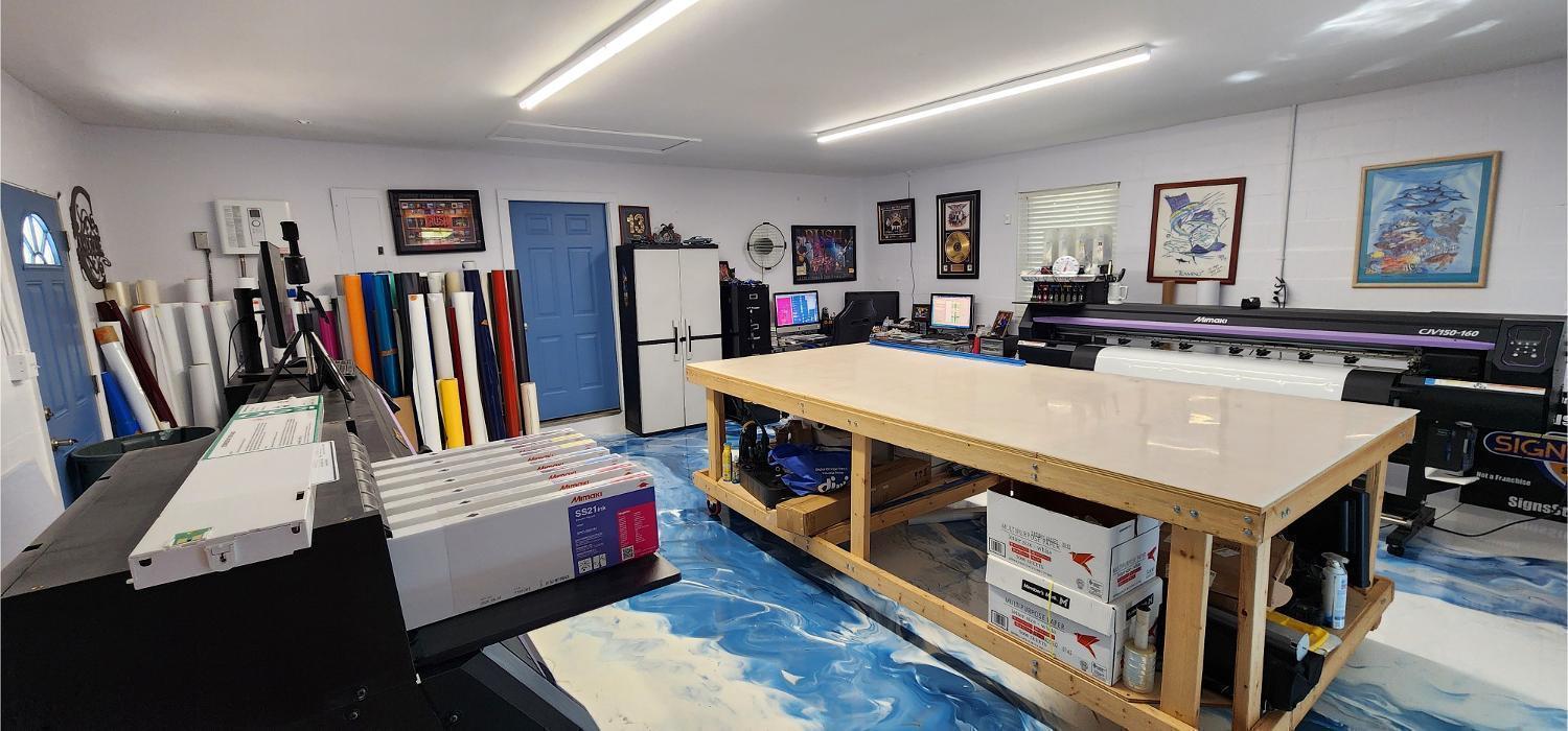 Inside The Signs & Stripes Office show case all of the print machines and Laminators