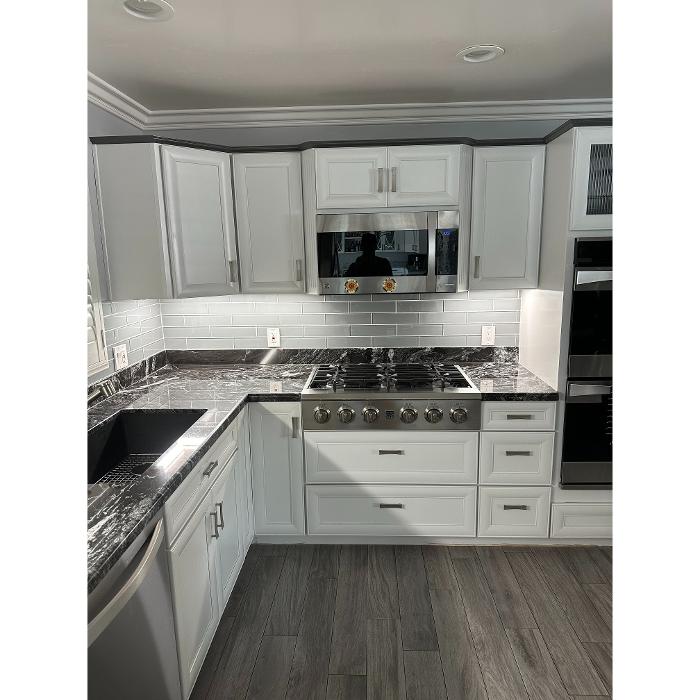 Completed white kitchen lighting and electrical, San Diego electrician.