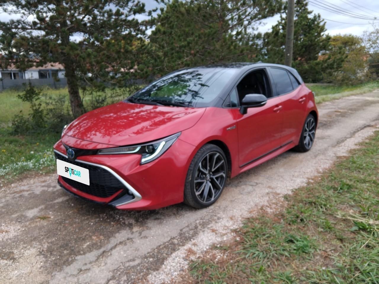 TOYOTA TOYOTA COROLLA Occasion Rouge Essence / Courant électrique 2020