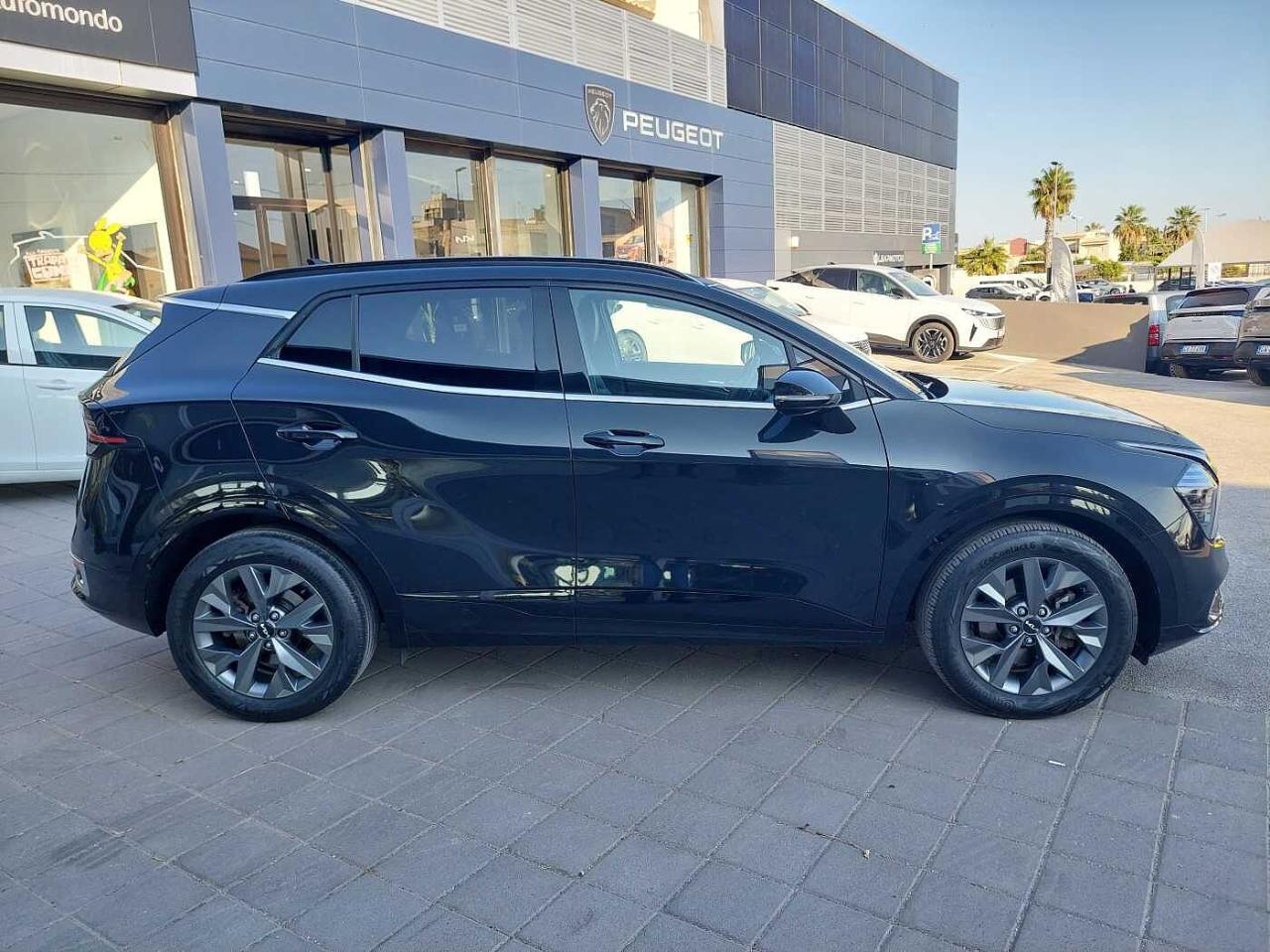 Kia Kia Sportage usata, con barre longitudinali al tetto