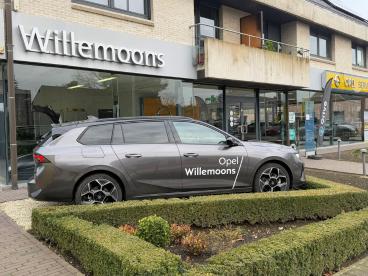 SPOTICAR Opel Astra Sports Tourer Ultimate 1.2t Mild-hybride 136pk Dem Occasions - Berline Hybride Gris - Laakdal - 400349759_2