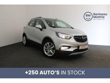 SPOTICAR Opel Mokka X 1.6 Benzine Edition *radio*airco*carplay*sensoren Tweedehands - Suv Benzine Argent - Roeselare - 400363866_1