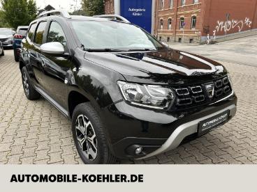 SPOTICAR Dacia Duster 1.6 4x2 Prestige Navi Kamera Dab Shz Gebraucht - Suv Benzin Schwarz - Siegen - 1201193270_1