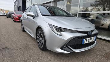 SPOTICAR Toyota Corolla Hybride 122h Design Occasion - Berline Hybride Gris Clair - Commercy - 1203788019_1