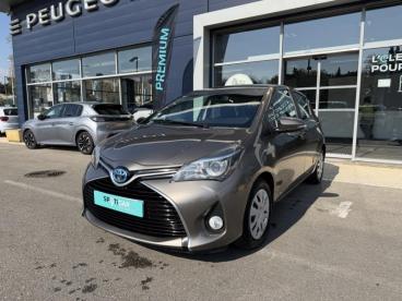 SPOTICAR Toyota Yaris Hsd 100h Dynamic 5p Occasion - Citadine Hybride Gris Dune - Marseille - 1203948260_1