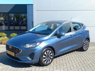 SPOTICAR Ford Fiesta 1.0t Hybrid 125pk Titanium I Trekhaak (1000kg | Cl Tweedehands -  Hybride Blauw - Elst - 1200292575_1