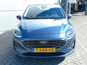 SPOTICAR Ford Fiesta 1.0t Hybrid 125pk Titanium I Trekhaak (1000kg | Cl Tweedehands -  Hybride Blauw - Elst - 1200292575_2