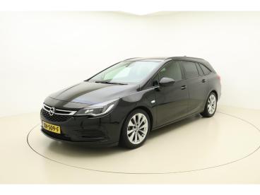 SPOTICAR Opel Astra Sports Tourer 1.0 Online Edition | Navigatie | Tre Tweedehands - Stationwagen Benzine Zwart - Emmeloord - 1200280117_1