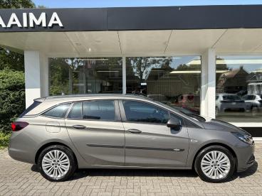 SPOTICAR Opel Astra Sports Tourer 1.4t 150pk Edition | Trekhaak | Appl Tweedehands - Stationwagen Benzine Bruin - Wirdum (fr) - 1200296815_4