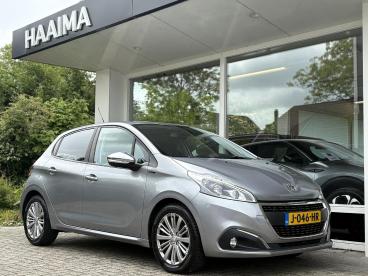 SPOTICAR Peugeot 208 1.2 82pk Signature | Weinig Kilometers | Navigatie Tweedehands -  Benzine Grijs - Wirdum (fr) - 1200294398_1