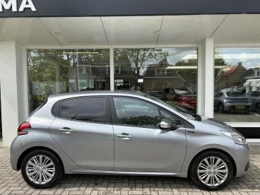SPOTICAR Peugeot 208 1.2 82pk Signature | Weinig Kilometers | Navigatie Tweedehands -  Benzine Grijs - Wirdum (fr) - 1200294398_2