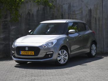 SPOTICAR Suzuki Swift Select 1.2 Smart Hybrid 90pk 100% Dealer Onderh. | Tweedehands -  Hybride Grijs - Heerlen - 1200297384_1