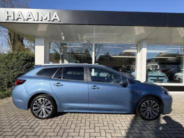 SPOTICAR Toyota Corolla Touring Sports 1.8 Hybrid Dynamic | Dealeronderhouden | Achteruit Tweedehands - Stationwagen Hybride Blauw - Wirdum (fr) - 1200287284_2